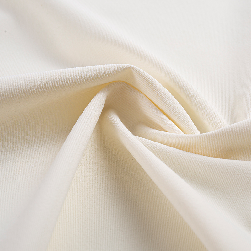 Material compozit cu filament elastic, asemănător bumbacului